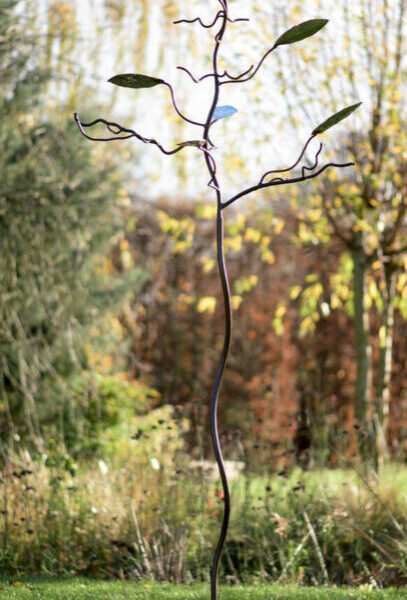 Birdfeeder-tree-with-oval-leaves-rustic-and-stainless-steel-sculptural-birdfeeding-station-by-Mark-Reed-e1630620964978