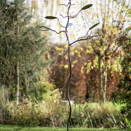 Birdfeeder-tree-with-oval-leaves-rustic-and-stainless-steel-sculptural-birdfeeding-station-by-Mark-Reed-e1630620964978